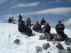 The group having a snack on the summit of Little Sister.