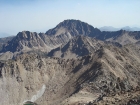 View of Castle Peak, SSE from Lonesome Peak. Serrate Ridge and Merriam Peak to the left.