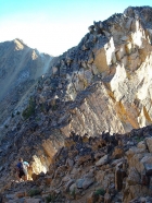 Sean crossing through a notch on Patterson's northeast ridge.