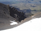 George climbing the steep snowfield to reach the west ridge.