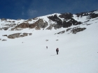 John and Pat crossing a large snowfield on the way to McIntyre.