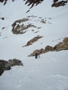 John carefully making his way up the snow vein.