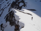 John climbing towards Little Mac, giving plenty of room to those cornices.