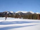 John hiking in the flats with McDonald Peak in the background.