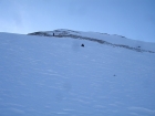 This is George attempting a glissade, but the snow was a bit on the powdery side.