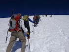 Climbing the stairs, someone else sliding down.