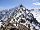 Making our way along the north ridge of Newman Peak, our route in red.