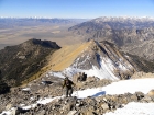 Michael climbing the west ridge of North Twin, Red Cone Peak in the background.
