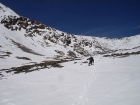 John post-holing across a snowfield on our way back.