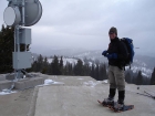 Here's John standing on the old foundation on the summit.