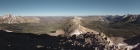 Panoramic view looking back, Sawtooths in the distance.