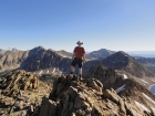 Dave on the summit of Patterson Peak, ridge leading to Mount Frank on the right.