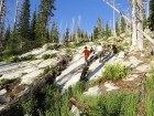 Climbing some fun granite slabs en route to Marge Lake.