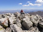 Steve arriving at the summit of Pegasus Peak.