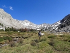 Steve hiking out of Surprise Valley.