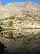 Peak 11887' reflecting in Baptie Lake.