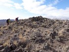 Reaching the summit of the middle peak.