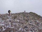 Reaching the summit of the upper peak.