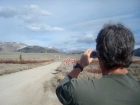 John taking advantage of a photo op. Pole Creek Peak #3 is the snowy one.