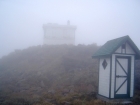A foggy view of the summit buildings.