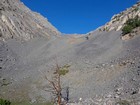 Heading above tree line and into the talus.