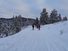 Easy trail breaking thanks to snowmobile tracks.