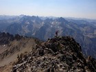Leaving the summit of Baron Peak, Warbonnet in the background, Rakers in the distance.