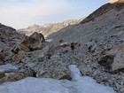 Making our way through debris in the cirque north of Baron Peak.