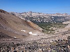 View west from the saddle. Elk Peak in the distance, Cramer Lakes just visible below.