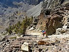 Jammie climbing some slabs on She Devil.