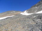 Angling up the scree to reach the saddle south of Ross Peak.