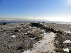 Tattered flag on the summit of Sinker Butte.