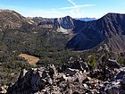 View east from the summit highlighted by Ivory Peak above Phyllis Lake, Ebony Peak on the right.