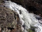 Partially frozen creek on the way down,