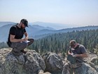 Signing the summit register.