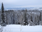 Looking south from the trail across the Boise Basin to Schafer Butte and Mores Mountain.