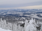 Summit view to the south across the Boise Basin with Schafer Butte and Mores Mountain in the distance.