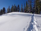 Heading up some open slopes.