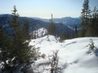 George on the lower portion of the south ridge with Baldy in the background.
