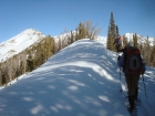 Snowshoeing along the ridge, summit in the distance on the left.