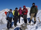 Colorful group shot on the summit of The Cone. Photo by Erik P.