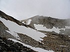 Talus and boulder section, Mount Carter in the distance.