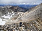 Making our way up Mickey's Spire with the Goat Lake drainage far below.