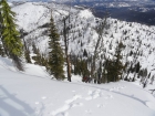 Descending the spooky east face of Thunderbolt Mountain.