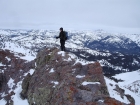 Here's George nearing the summit of Titus Peak with Castle Peak in the background.