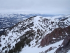 The view from Titus Peak towards Lower Titus with the Sawtooths in the background.