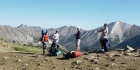 The view north from Antz Basin Divide, David O Lee Peak in the background, Arron, Jordan, JJ, and Ken in the foreground.