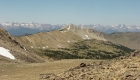The view west from Four Lakes pass includes Antz Basin, Blackmon Peak, and the Sawtooths in the background.