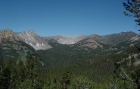 The view west from the trail into Washington Basin. Croesus Peak is on the left with the steep face, Washington Peak is back and to the right.