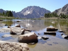 Castle Peak and Serrate Ridge from the small tarn near Windy Devil pass.